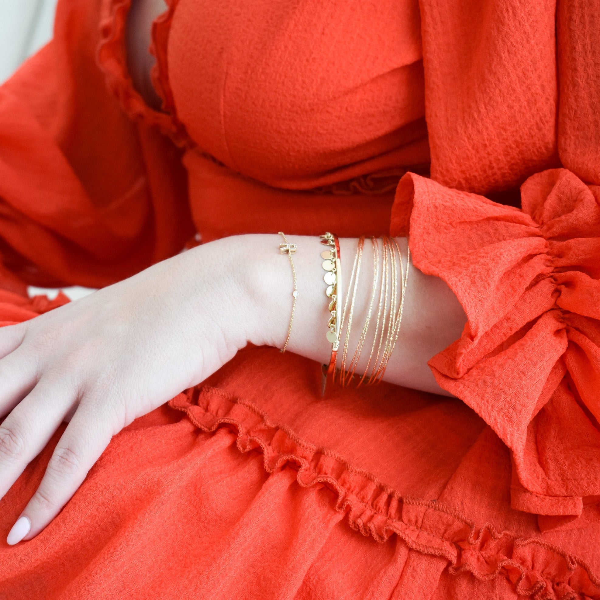 14K solid yellow gold multi-strand flexible diamond-cut bracelet with lobster clasp and adjustable extender chain.